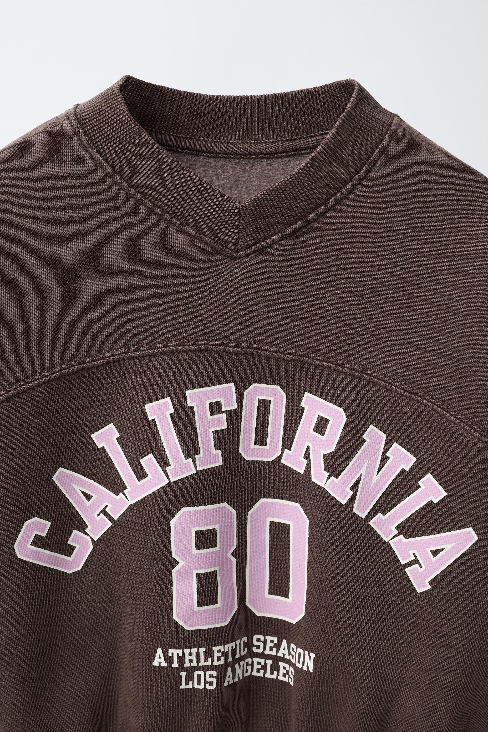 WASHED-EFFECT GRAPHIC SWEATSHIRT